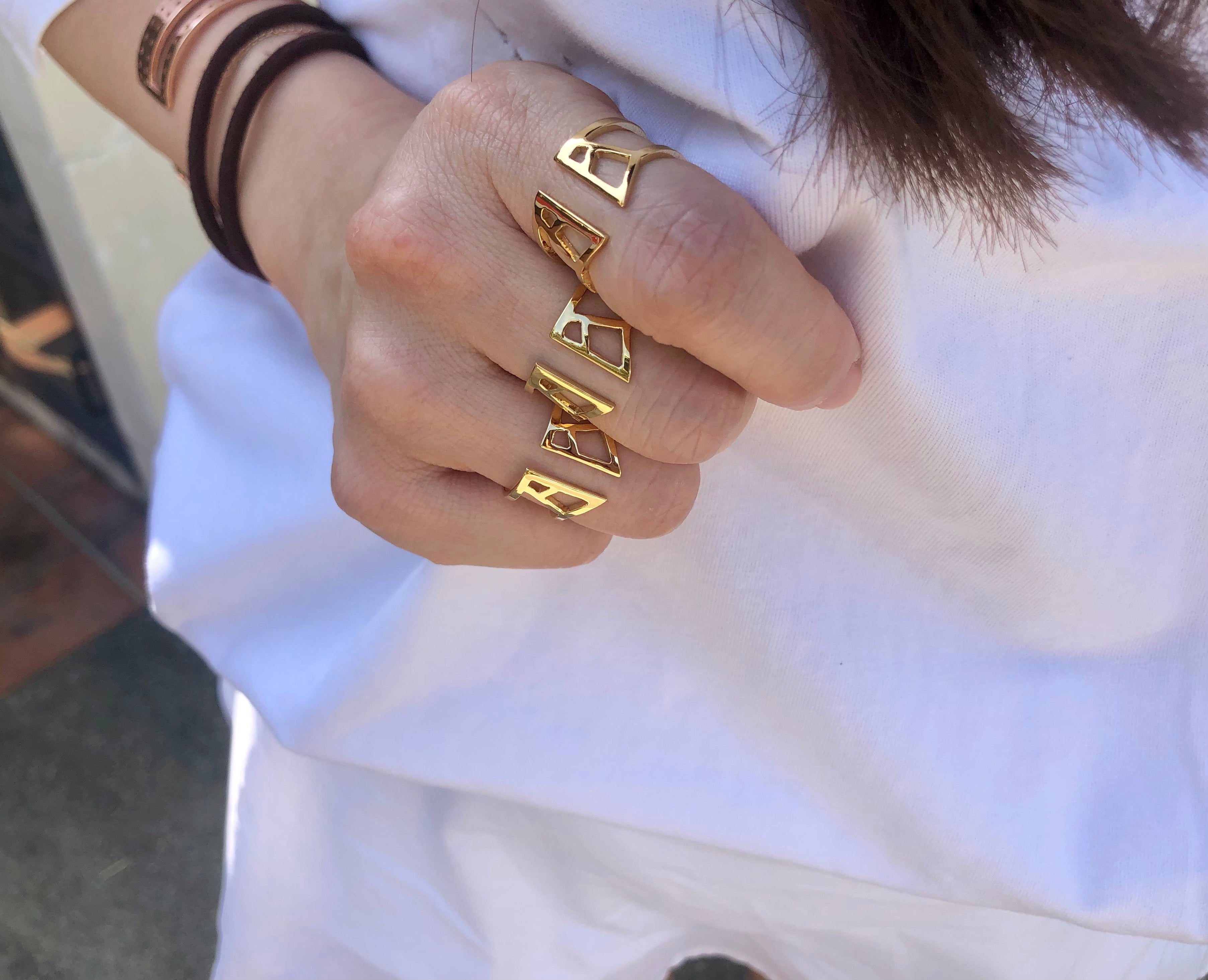 gold sustainable jewellery recycled rings cuffs ethical accessories women